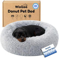 Calming Donut Dog Bed – Faux Fur Anti-Anxiety Pet Bed by Unknown